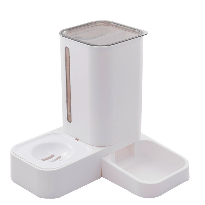 Dispensador automático con depósito de comida y agua para mascotas.